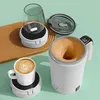 A collection of self-stirring mugs and a coffee cup on a light green background with a wooden tray. Produktbild-Vorschau