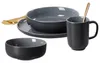 A set of dark gray ceramic dishes and a gold spoon on a white background. Produktbild-Vorschau