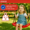 A young girl is happily swinging on a red swing in a park-like setting. Anteprima dell’immagine prodotto