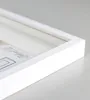 A close-up view of the corner of a white 3D object frame, showing its depth and texture. Produktbild-Vorschau