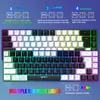 A close-up marketing image of a gaming keyboard with RGB lighting, showing different modes and functions. Produktbild-Vorschau