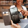 A person is using a phone case with card slots while making a payment. Produktbild-Vorschau