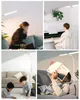 A collage of four images showing a floor lamp in different settings and uses. Podgląd zdjęcia produktu