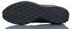 The sole of a black Nike shoe is shown against a white background. Náhled obrázku produktu
