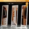 Three full-length mirrors with integrated LED lighting are displayed at different brightness levels (10%, 50%, 100%) to showcase the dimmable feature. Produktbild-Vorschau