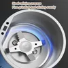 Close-up view of the interior of a coffee grinder, showing the blades and steel interior. Produktbild-Vorschau