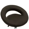 A close-up view of a brown faux leather stool seat with a curved backrest. Náhľad obrázku produktu