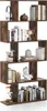 A bookshelf with various items displayed on its shelves. Anteprima dell’immagine prodotto