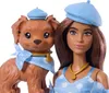 A Barbie doll and her dog are shown together, both wearing matching blue outfits with white polka dots and blue berets. Podgląd zdjęcia produktu