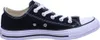 A side view of a black Converse All Star low-top sneaker with white laces and white soles. Voir les images du produit