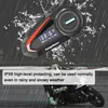 A motorcycle helmet communication device is shown in the rain, with a motorcyclist in the background. Náhled obrázku produktu
