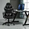 A gaming chair and desk setup in a room. Produktbild-Vorschau