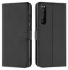A black flip case for a Sony Xperia 5 III phone is shown from the front and back. Náhled obrázku produktu