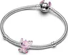 A silver bracelet with two charms shaped like Disney characters. Podgląd zdjęcia produktu