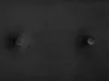A close-up view of a black tufted fabric surface with diamond stitching and two buttons. Náhled obrázku produktu