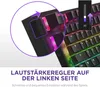 Close-up of a black keyboard with RGB lighting, highlighting a volume control dial on the left side and a digital volume indicator overlay. Produktbild-Vorschau
