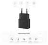 A black USB-C fast charging adapter with icons and text describing its features. Produktbild-Vorschau