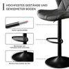 A close-up view of a black bar stool, with diagrams illustrating its features. Produktbild-Vorschau