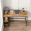 A vintage-style computer desk with two shelves, set up in a home office environment. Podgląd zdjęcia produktu