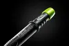 A close-up shot of a black automatic pencil with a green cap against a black background. Anteprima dell’immagine prodotto
