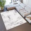 A modern living room with a large sectional sofa and a rug. Produktbild-Vorschau