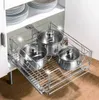 A pull-out kitchen cabinet organizer with pots inside. Náhled obrázku produktu
