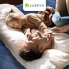 A father and daughter are lying on an air mattress, laughing and playing. Produktbild-Vorschau