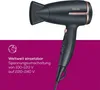 A black hairdryer with rose gold accents is shown against a white and purple background. Text and a globe icon are present on the purple section. Podgląd zdjęcia produktu