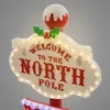 A close-up of a festive Christmas decoration signpost. Podgląd zdjęcia produktu