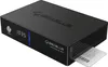 A black GigaBlue UHD Trio 4K PRO receiver is shown from a diagonal angle, with a smart card partially inserted into a slot on the right side. Produktbild-Vorschau