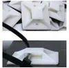 A collage of two images showing white cable tie mounts. The top image shows a pile of the mounts, and the bottom image shows one mount with a black cable tie inserted. Produktbild-Vorschau