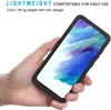 A hand holding a smartphone in a black protective case. Produktbild-Vorschau