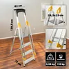 A step ladder is shown in a room with wooden floors and light-colored walls. The image includes close-up views and dimension labels. Podgląd zdjęcia produktu