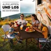 A family is enjoying a picnic outdoors with a camper van in the background. Anteprima dell’immagine prodotto