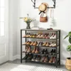 A shoe rack filled with various shoes is placed in an entryway, with a coat rack and decorative items on the wall above. Náhled obrázku produktu