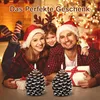 A family celebrating Christmas with pine cone candles and gifts. Produktbild-Vorschau