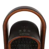 Close-up view of the top of a black and brown electric heater. Anteprima dell’immagine prodotto