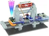A close-up shot of a Baukasten Boffin II electronic construction kit with various components and a fiber optic light. Podgląd zdjęcia produktu
