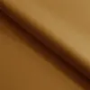 A close-up view of a folded piece of brown fabric, likely upholstery or bedding material. Náhled obrázku produktu