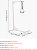A white medical bed assist device with a handle, shown against a white background with dimensions and specifications overlaid. Voir les images du produit
