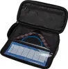 An open pencil case with stationery items inside. Produktbild-Vorschau