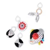 A collection of baby toys with black, white, and red patterns, arranged on a white background. Podgląd zdjęcia produktu