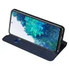 A blue flip cover case for a Samsung Galaxy S20 Fe 5G phone, shown from a diagonal angle with the phone screen displaying a blue and green abstract image. Náhled obrázku produktu