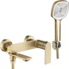 A gold-colored bathtub faucet with a showerhead attachment, displayed against a white background. Produktbild-Vorschau