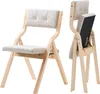 Two views of a folding chair with a beige upholstered seat and backrest, set against a white background. Náhled obrázku produktu
