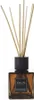 A diffuser with reeds in a glass bottle. Anteprima dell’immagine prodotto