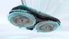 A close-up, dynamic shot of a robotic floor cleaner with spinning brushes, illustrating its cleaning action with particles being lifted. Produktbild-Vorschau
