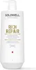 A white bottle of Goldwell Dualsenses Rich Repair Restoring Shampoo with a pump dispenser. Náhled obrázku produktu