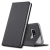 A dark gray flip case for a smartphone is shown standing upright, with the phone partially visible inside. Anteprima dell’immagine prodotto