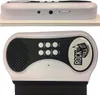 A top and front view of a white and black toy keyboard with a speaker and buttons. Produktbild-Vorschau
